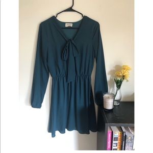 <Everly> Emerald green dress with bow